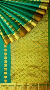 Ananda/mustard color Kanchipuram saree with equal zari border and designer pallu