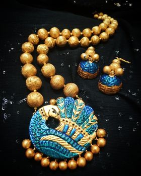 Gold and blue peacock pendant set