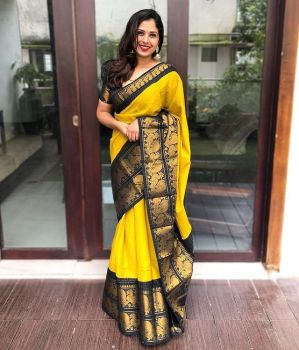 Yellow Peacock Design Lichi Silk Saree From Banaras