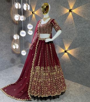 Maroon Heavy Georgette Sequence With Fancy Border Zari Work