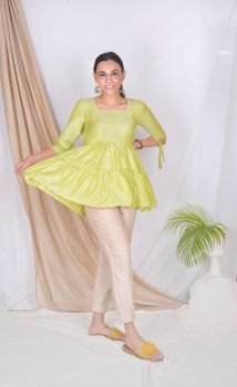 Green Flared Top With Beige Pants