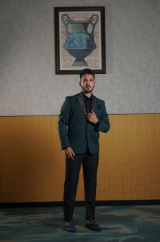 Green and black suit with contrast black lapel with trouser