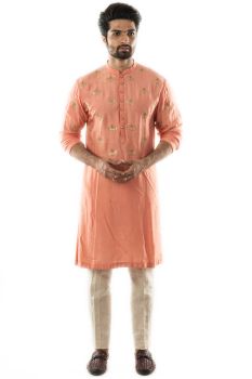 Peachish Orange Hand Embroidered Short Kurta paired with a Cream Pintuck Pant Pajama