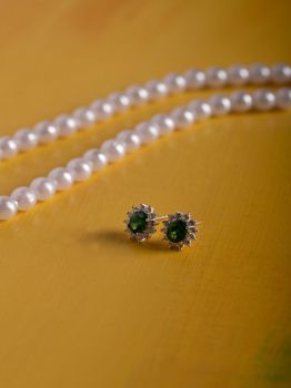 Oval Green Soltaire CZ Studded Rhodium Studs in 925 Sterling Silver