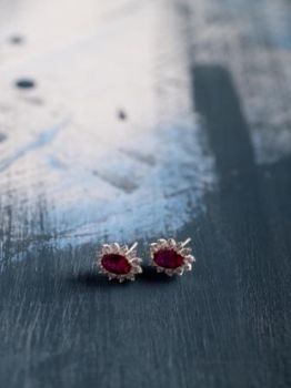 Oval Red Soltaire CZ Studded Rhodium Studs in 925 Sterling Silver