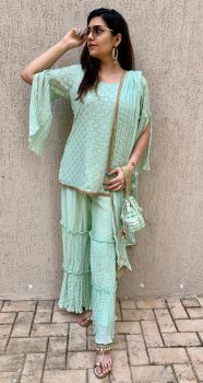 Mint green embroidered Sharara set with matching Potli