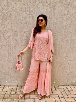 Peach Embroidered Sharara set with matching Potli