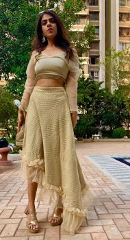 Green chikankari Asymmetrical skirt & satin crop top with oversized organza sleeves and matching Potli