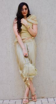 Green Satin tulip dhoti & chikankari top with a cowled organza sleeve and matching Potli