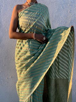 Green georgette lehariya pattern zari weave saree