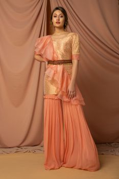 Brocade kurta with organza flared dupatta paired with sharara.