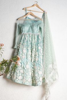 Light Teal Blue Blouse With Light Teal Blue And Offwhite Threadwork Lehenga Set