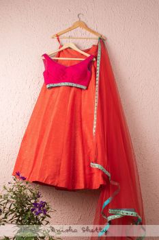 Fire Orange Lehenga With Pleated Hot Pink Blouse & Fire Orange Dupatta