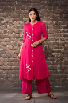 fuchsia pink linen georgette kurta with matching pants .