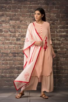 Baby pink linen silk kurta paired with matching pants and dupatta with khadi print.