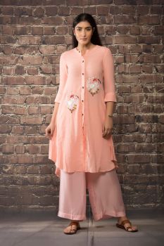 Old rose pink linen silk kurta paired with matching pants