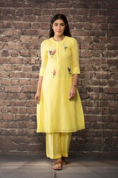 yellow handloom linen twill kurta paired with matching pants.