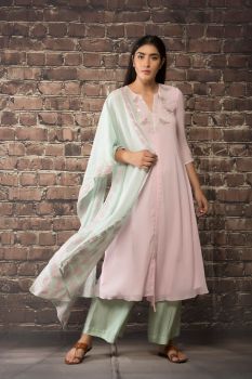 baby pink linen georgette tunic paired with matching pants and dupatta.