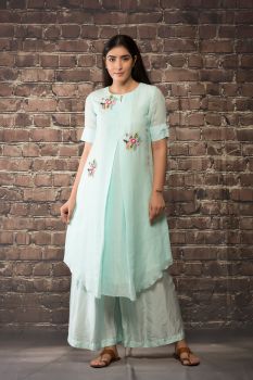 ice blue handloom linen twill kurta paired with matching pants..