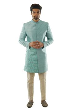 Pastel Blue Achkan In Raw silk, Adorned with Cord Piping Detail and Minimal Hand Embroidery. Paired with Narrow Fitted Cream Pintuck Pant Pajama