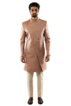 Mauve Asymmetric achkan in Linen Satin, adorned with zardozi and pearl hand embroidery. Paired with Narrow Fitted Cream Pintuck Pant Pajama