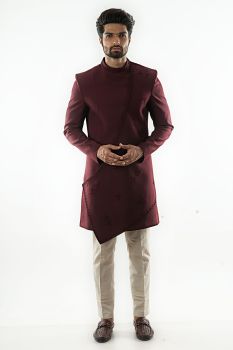 Red Wine Asymmetric Achkan With Monochrome Silk Thread and Bead Embroidery. Paired ith Narrow fitted Cream Pintuck Pant Pajama.