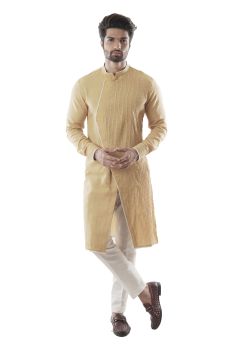 Mustard Asymmetric Kurta set with Pintucked Embroidered Panel. Paired with Narrow Fitted Pant Style Pajamas