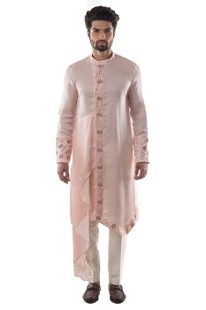 A dusty pink assymetric kurta with zardozi embroidery.