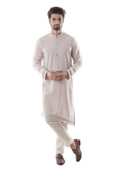 An Ice Grey Assymetric Kurta With Pin-tucks Detailing On The Hemline. Paired with Cream Narrow Fitted Pant Pajama