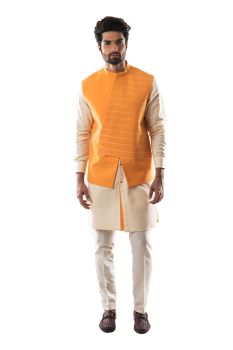 Yellow Asymmetrical Bandi with Katha and Challa Hand Embroidery. Paired With A Creamish Yellow Shirt Kurta and Narrow Fitted Pant Pajama.