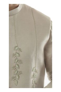 An Oyester Grey Nehru With Minimal Zari And Threadwork Embroidery.