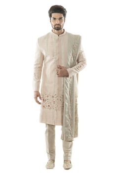 Baby Pink Sherwani in Combination Jaal and Linear Hand Embroidery, Using French KnotWork and Zardozi Technique. Paired With an Embroidered Dupatta in Light grey and Pant Payjama.