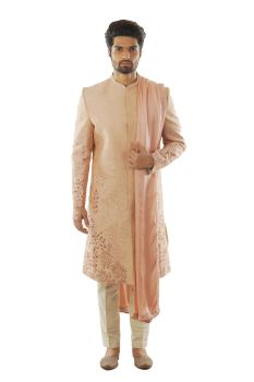 Light Mauve Sherwani with Shaded Jaal Embroidery using Silk Threads. Paired with A Dupatta and Cream Pant Payjama.