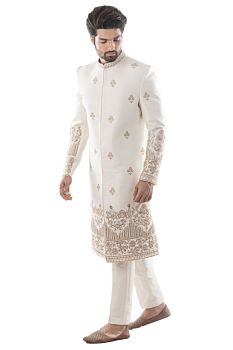 Ivory Sherwani With Heritage Embroidery Using Maal Dabka Work. Paired with Cream Pant Payjama