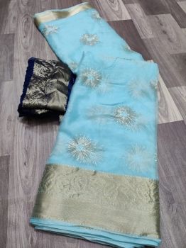 Sky Blue Sequence Work Pure Organza With Zari Pallu And Border.