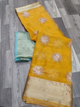 Yellow Sequence Work Pure Organza With Zari Pallu And Border.