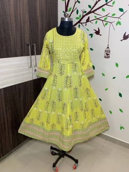 Yellow Cotton Kurti Flex With Mirrors Embrodery Work
