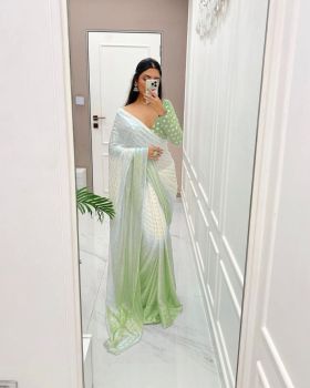 White Pista Green Motifs Sequence Work Georgette Silk Saree