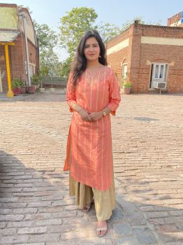 Orange kurta with olive plazo